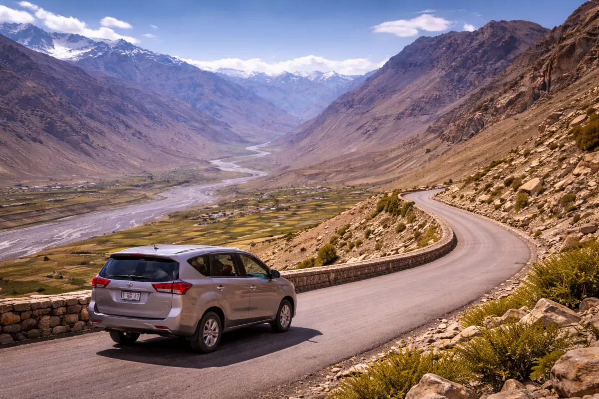 Spiti Valley Himachal Pradesh India scenic road trip car on mountain road valley river landscape adventure travel destination Himachal Pradesh tour package