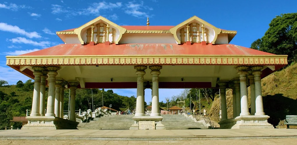 Talakaveri Temple in Kodagu during daylight, featuring hilltop temple and scenic Western Ghats, perfect spiritual experience, Karnataka tour packages.