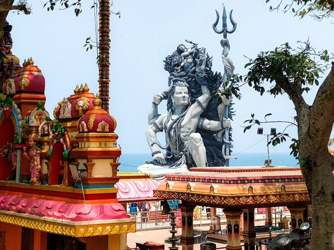 Aazhimala Shiva Temple, Kerala India giant Lord Shiva statue, seaside Hindu pilgrimage site by Arabian Sea.