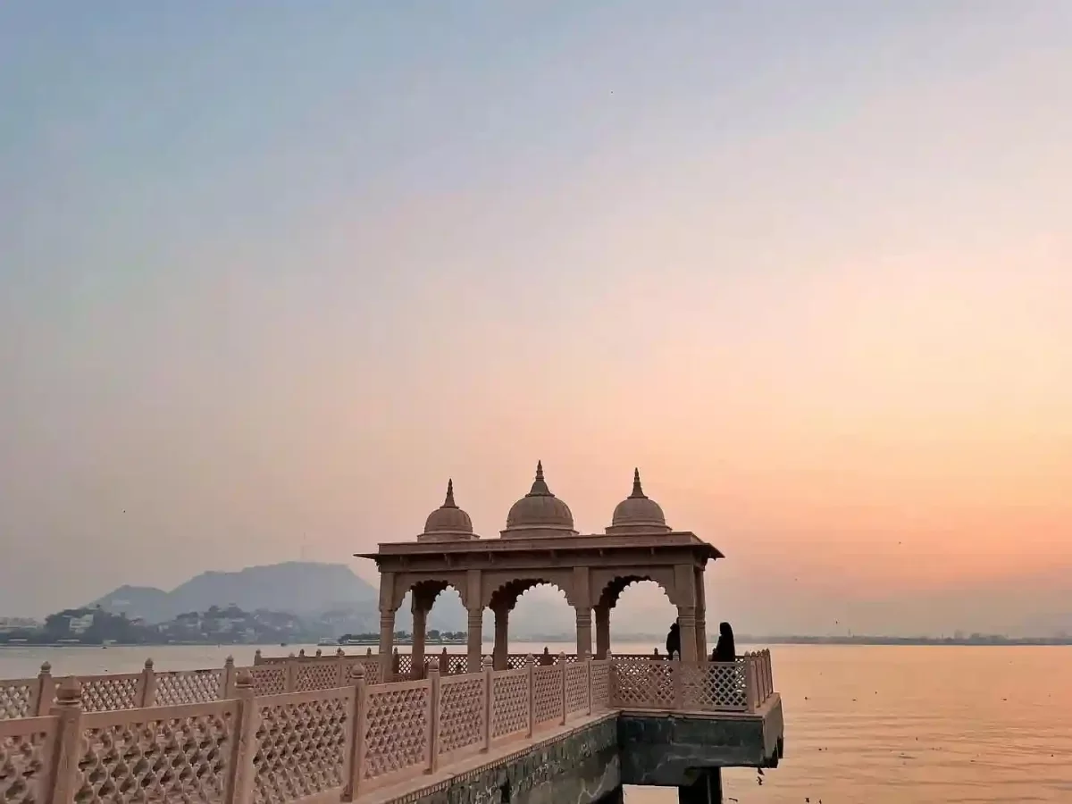 Ana Sagar Lake Sunset view of a marble chhatri pavilion and stone walkway at the historic artificial lake in Ajmer.