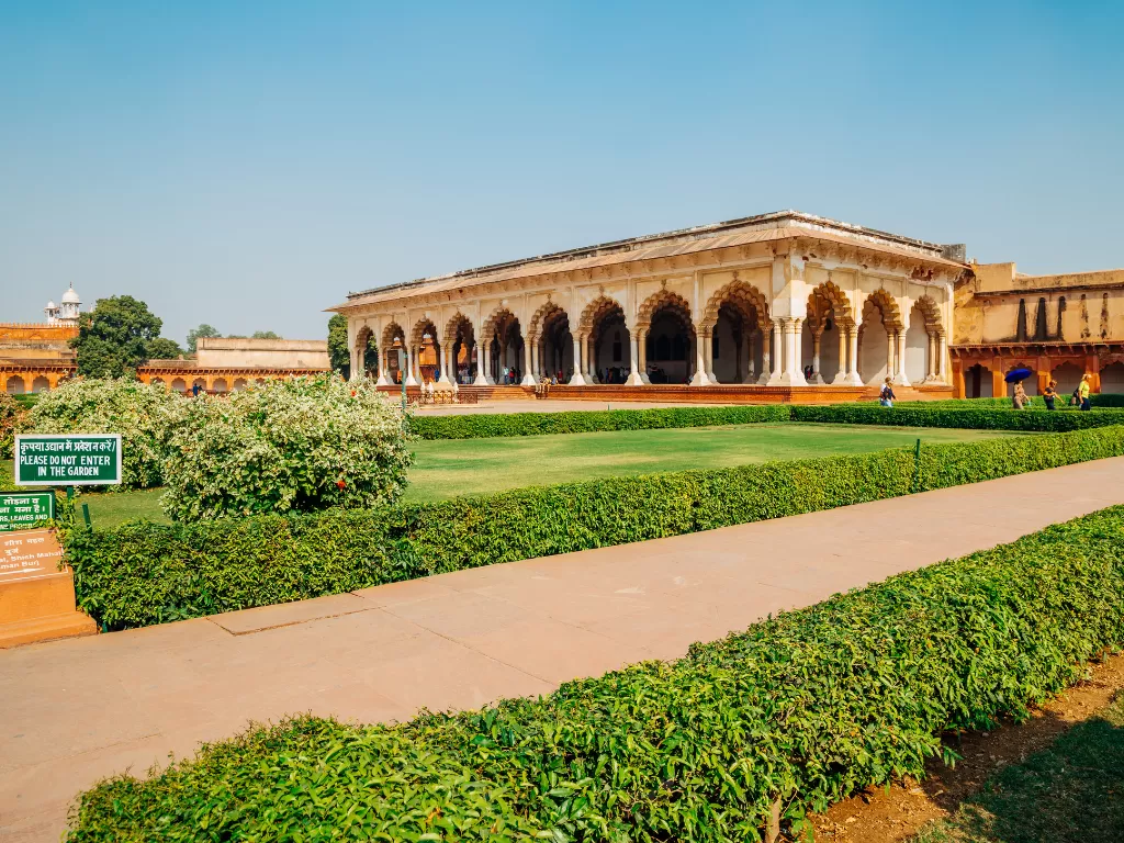 Baby Taj Mahal (Itimad-ud-Daulah's Tomb) in Agra features ornate arches, lush gardens, and pathways under clear skies, perfect heritage experience Agra tour package