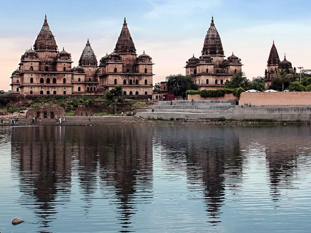 Betwa River View Point in Orchha, Madhya Pradesh with cenotaph temples reflected in the river, featured in Madhya Pradesh tour packages