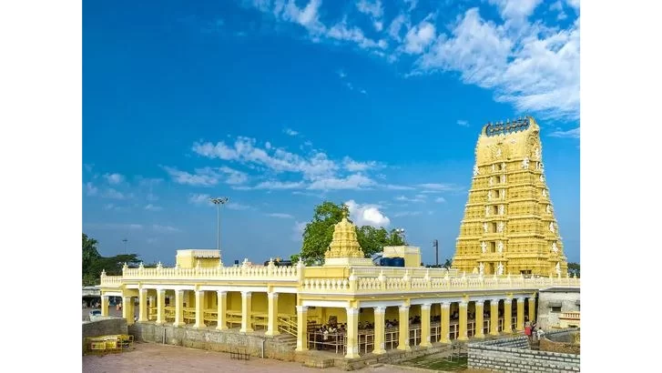 Chamundi Hills. Chamundeshwari Temple gopuram on Chamundi Hills, Mysore with blue sky and Dravidian architecture.