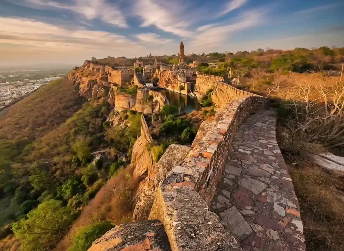 Chittorgarh Fort massive stone ramparts and historic Victory Tower at the UNESCO World Heritage hill fort in Rajasthan.