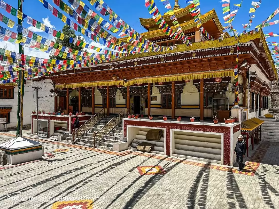 Chokhang Vihara Temple, prominent Buddhist temple in Leh, Ladakh adorned with colorful prayer flags.