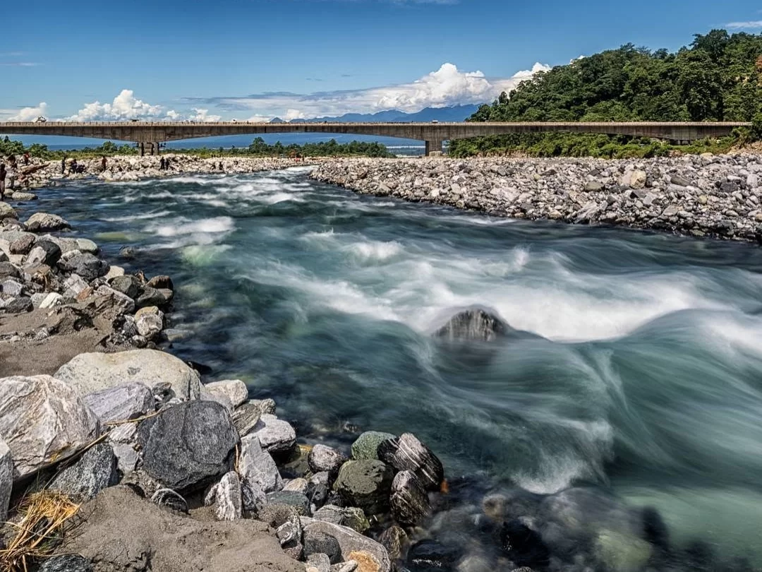Deopani River crystal clear mountain river flowing through rocky landscapes and lush greenery in Arunachal Pradesh Package.