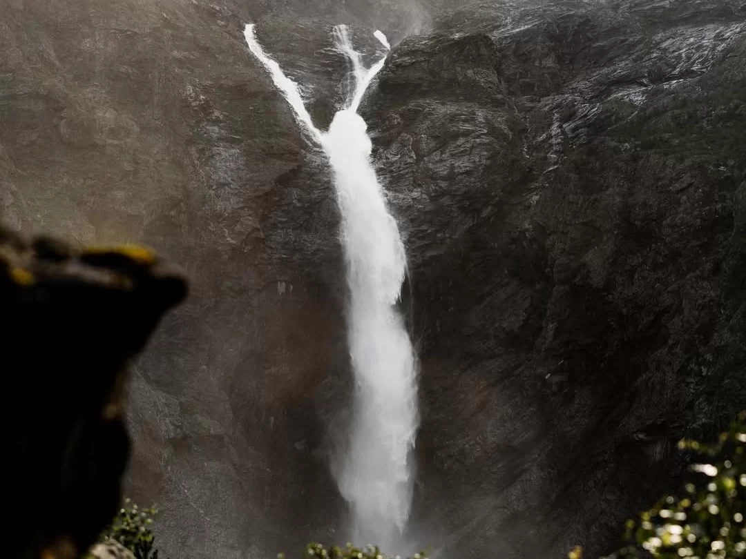 Dhobi Waterfall cascading stream amidst rocky cliffs in Mahabaleshwar Maharashtra tour packages