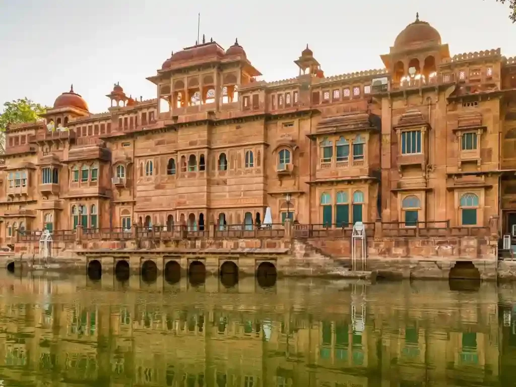 Gajner Lake scenic artificial lake surrounded by a sanctuary and the red sandstone Gajner Palace in Bikaner Rajasthan.