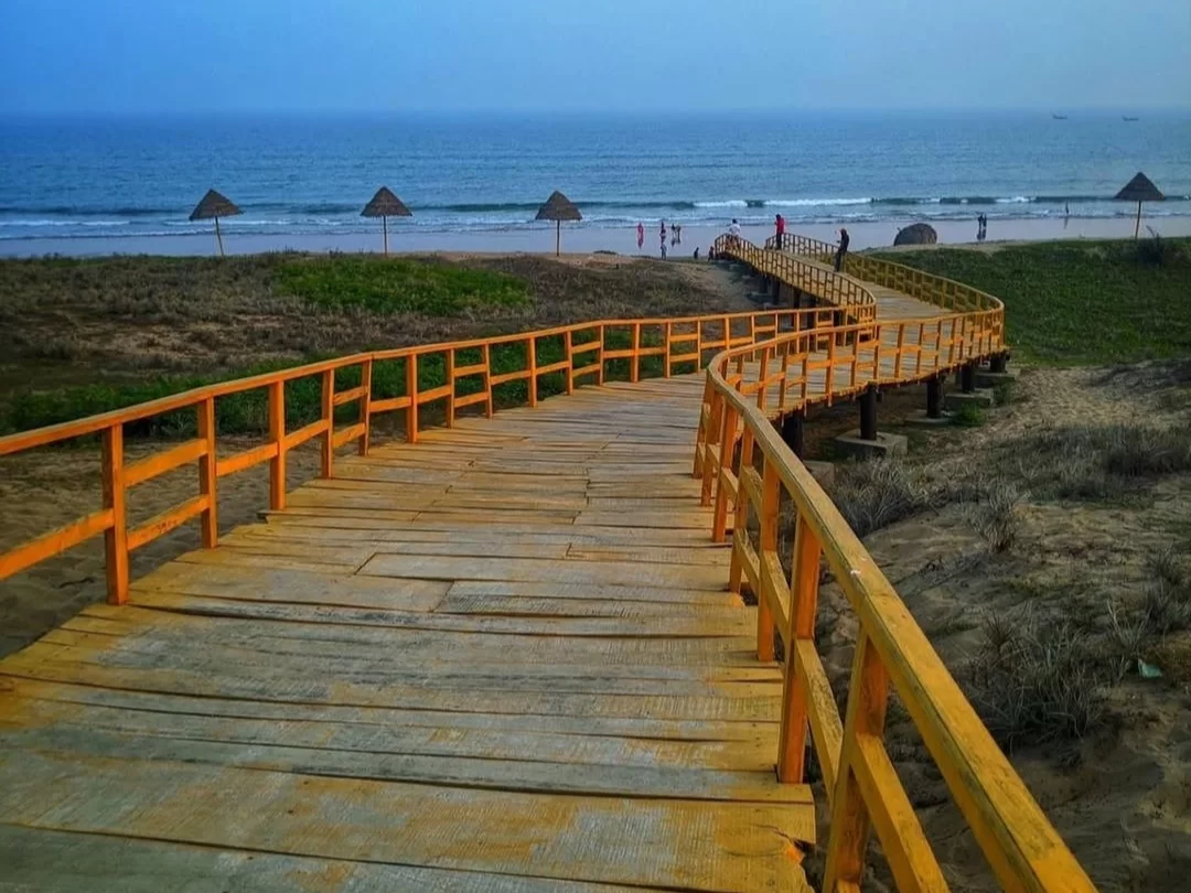 Gopalpur Beach, serene coastal getaway in Odisha known for golden sands, gentle waves, and scenic seaside views.