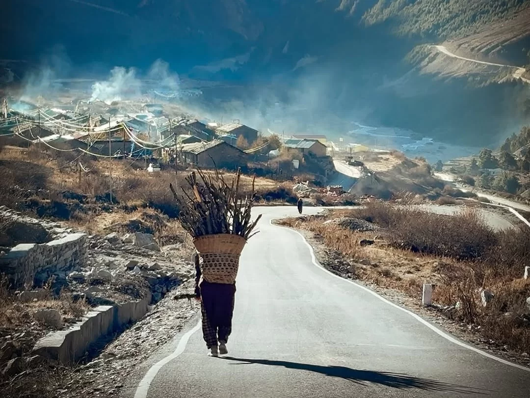 Gunji village scenic mountain road with local lifestyle and Himalayan landscape in Uttarakhand tour packages.