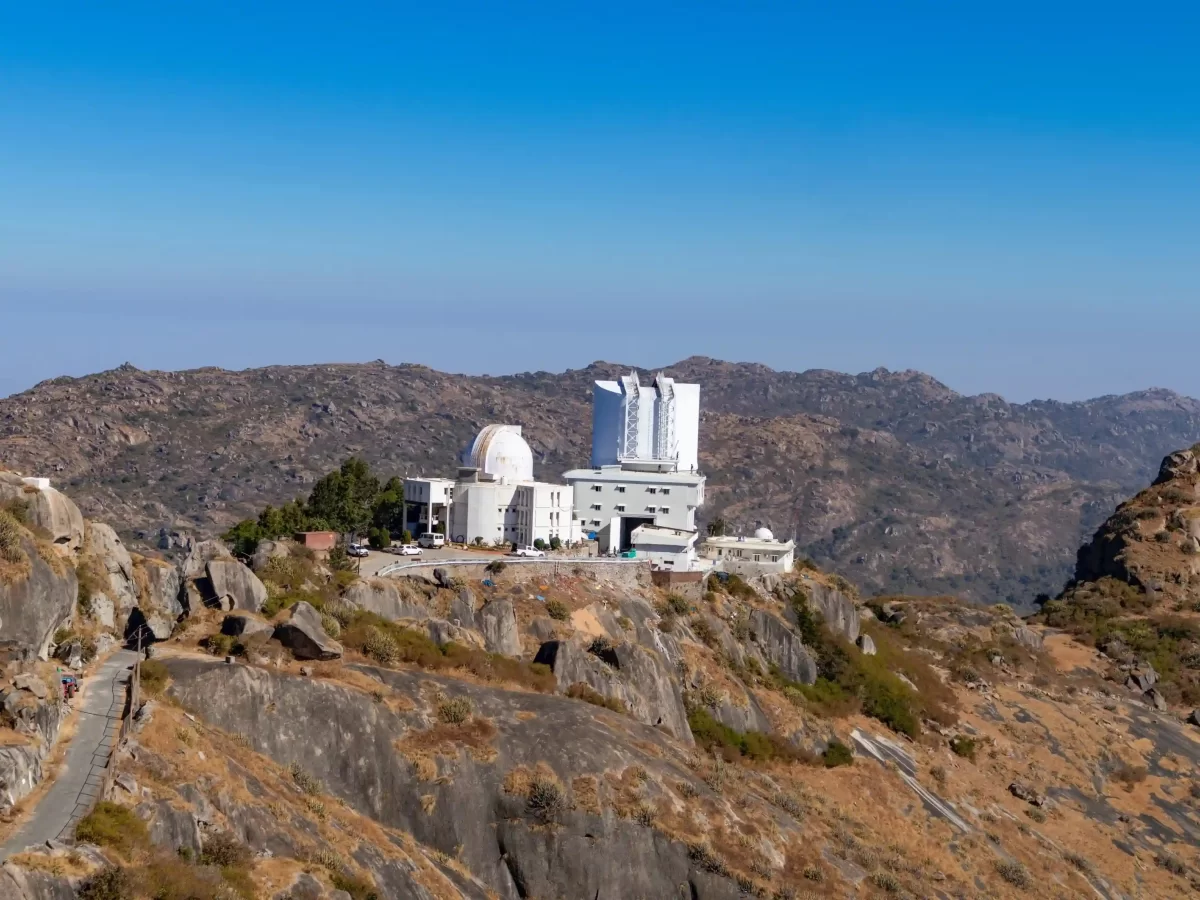 Guru Shikhar highest peak in the Aravalli Range featuring a small white temple dedicated to Lord Dattatreya in Mount Abu Rajasthan.