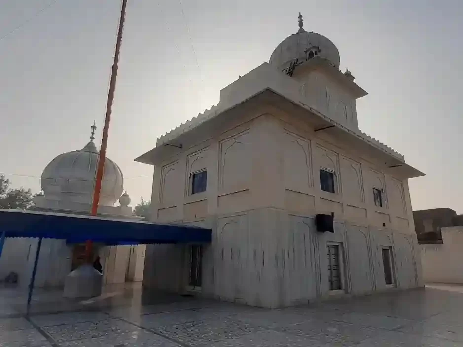 Gurudwara Sri Guru Singh Sabha magnificent white marble Sikh temple featuring a central dome and traditional architecture in the heart of Udaipur Rajasthan.