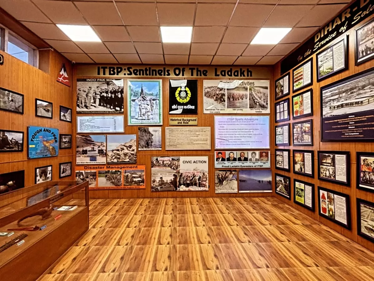 Hall of Fame Leh Ladakh ITBP Indo-Tibetan Border Police Sentinels exhibit room wooden walls framed black white photos soldiers operations awards display cases military history Kargil heroes.