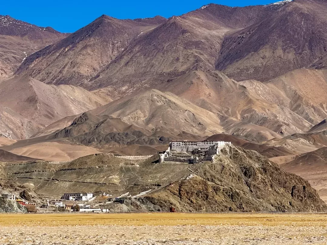Hanle Monastery Ladakh dramatic barren mountains blue sky, ancient Drukpa Kagyu gompa Changthang valley heritage, perfect observatory stargazing cultural package.