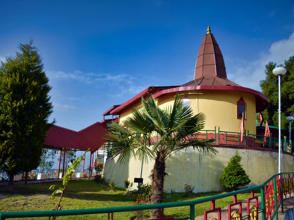 Hanuman Tok Gangtok Sikkim during clear skies, featuring hilltop temple gardens mountain views, perfect spiritual sunrise experience Sikkim tour package.