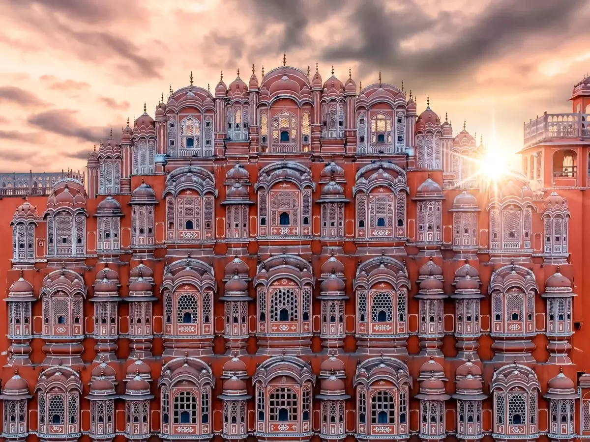 Hawa Mahal iconic pink sandstone Palace of Winds with 953 honeycombed windows and intricate latticework in the heart of Jaipur Rajasthan.