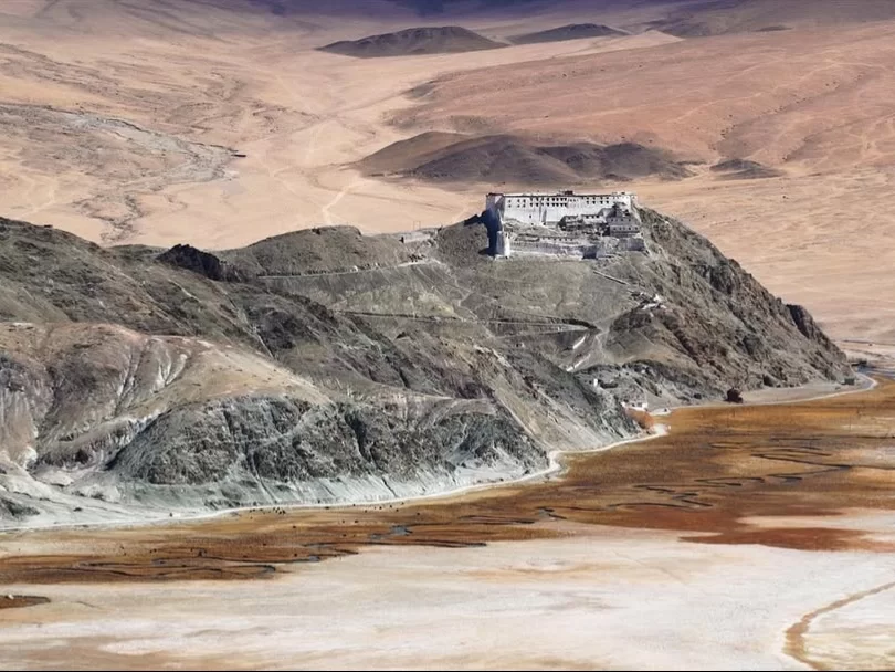 Hanle Monastery Ladakh aerial drone white gompa fortress rocky ridge barren desert valleys brown streams, 17th century Drukpa Kagyu Sengge Namgyal Hanle Valley, perfect observatory stargazing spiritual package.