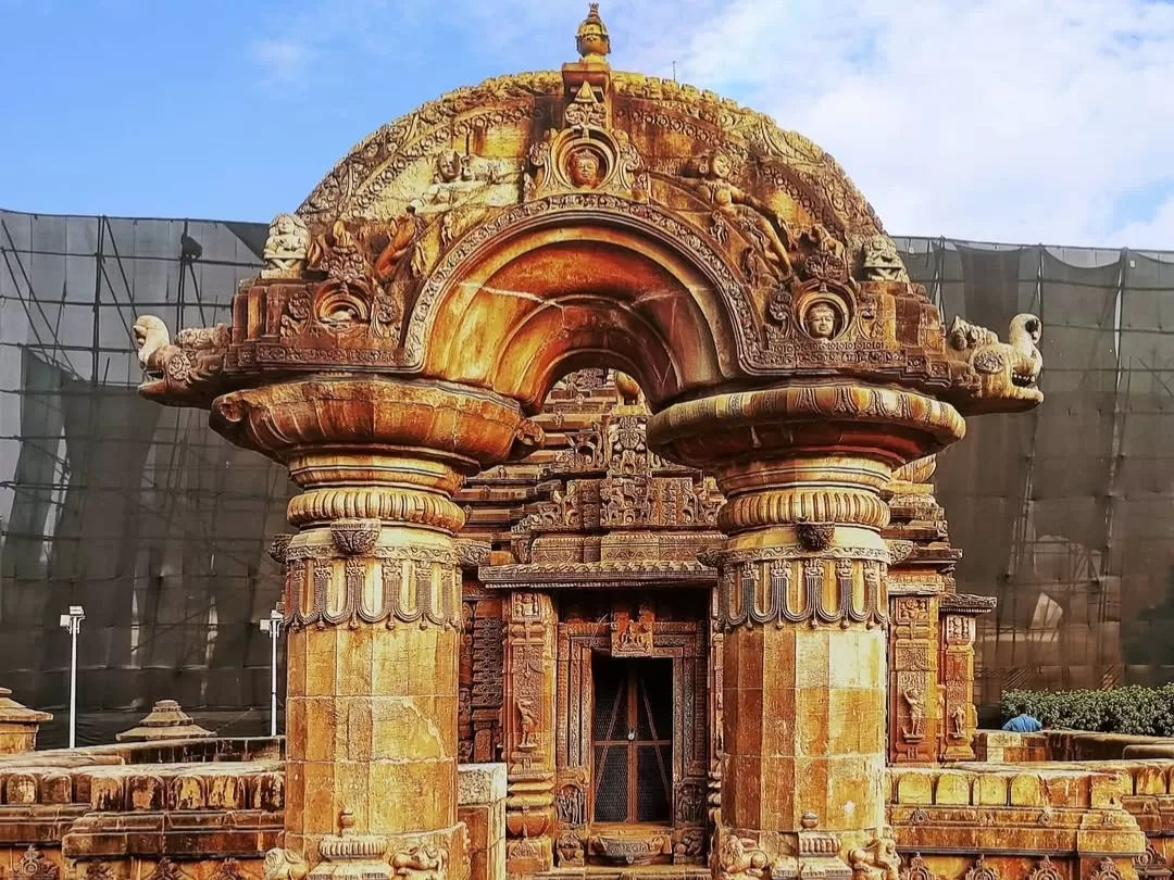 Mukteswara Temple arched entrance at Bhubaneswar on golden hour, featuring Kalinga Nagara torana gateway, perfect Odisha heritage tour package