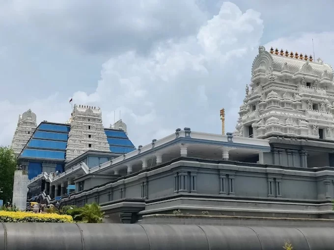 Iskcon Temple Banglore. ISKCON Sri Radha Krishna Temple with white gopuram and blue glass façade in Bengaluru, Karnataka.
