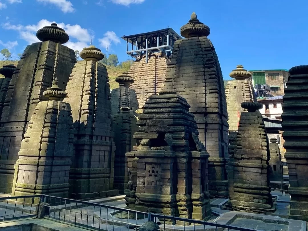 Ancient stone temples at Jageshwar Dham in Almora, Uttarakhand surrounded by cedar forests, a revered pilgrimage site included in Uttarakhand tour packages