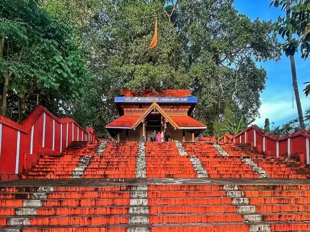 Janardhana Swami Temple in Varkala, ancient Hindu temple with traditional Kerala architecture and red steps.