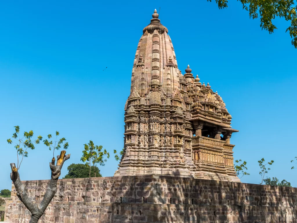 Javari Temple Khajuraho Eastern Group UNESCO site, Nagara-style Vishnu shrine with makara torana arch slender shikhara intricate carvings, ideal Madhya Pradesh Chandela heritage tour package.