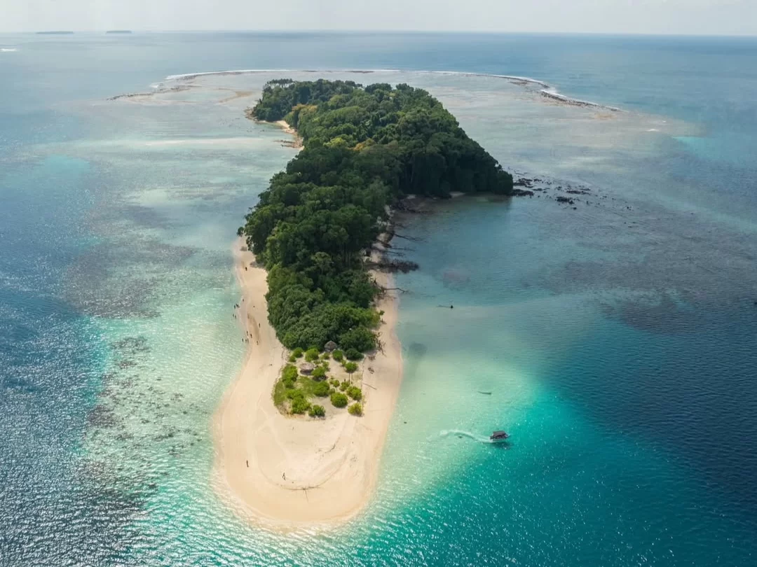 Jolly Buoy Island, pristine coral island in Mahatma Gandhi Marine National Park, Andaman known for crystal clear waters and vibrant marine life.