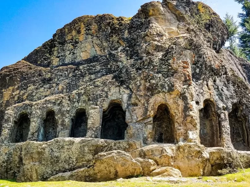 Kalaroos Caves Kupwara ancient rock-cut caves carved into limestone cliffs in Kashmir Valley
