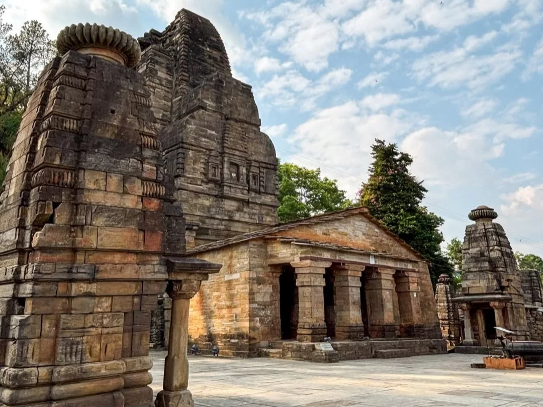 Ancient stone structures of Katarmal Sun Temple in Almora, Uttarakhand set against the hills, a historic architectural marvel included in Uttarakhand tour packages