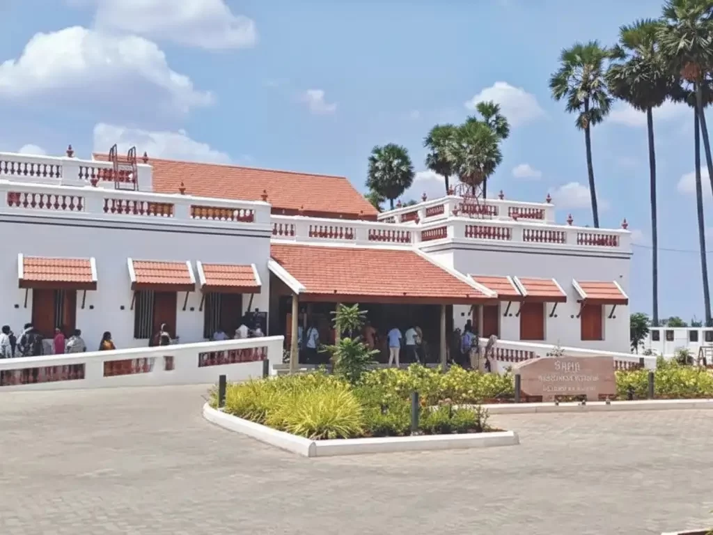 Keeladi Museum featuring ancient Tamil artifacts, terracotta pottery, and ivory ornaments in a modern gallery setting.