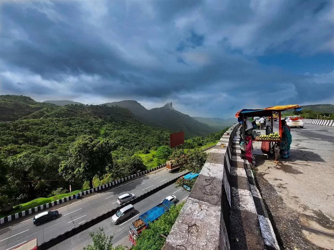 Khandala Ghat View Point. Scenic Western Ghats viewpoint with lush valleys and winding highway views near Lonavala.