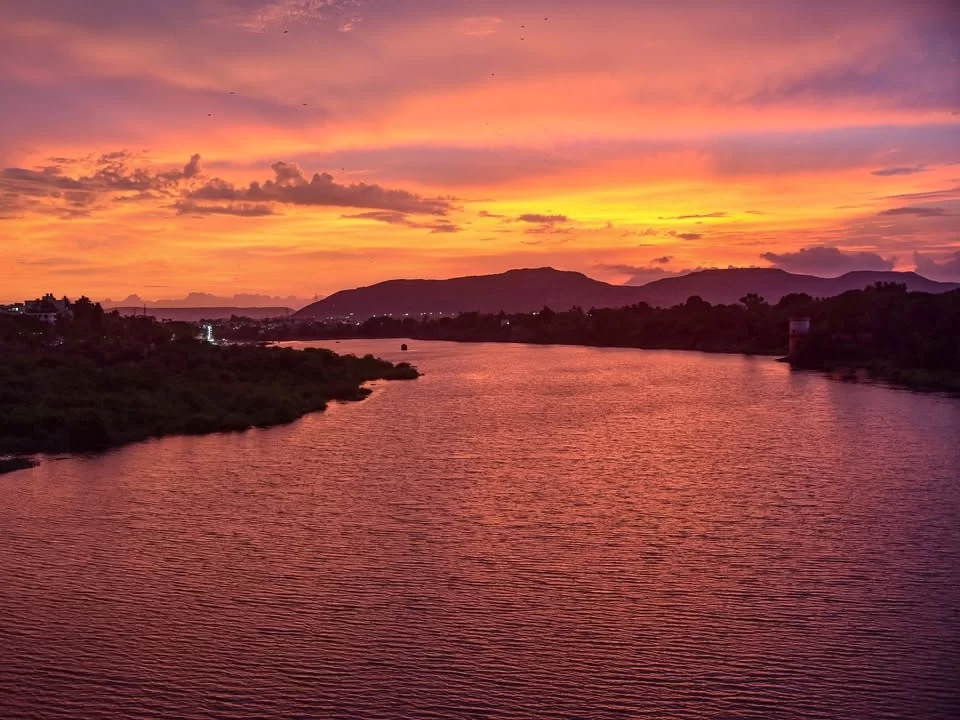 Krishna Riverfront Vijayawada beautiful sunset view over the river in Andhra Pradesh tour packages.