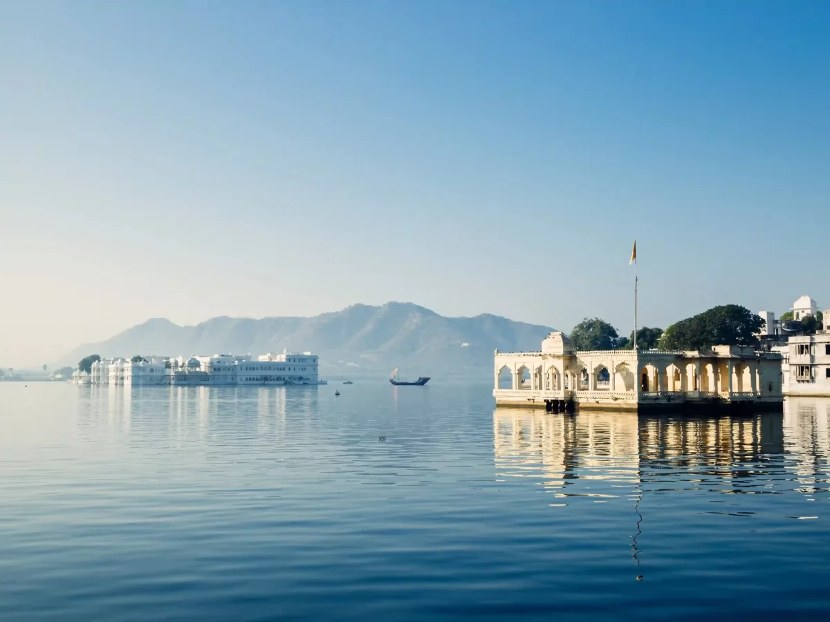 Lake Pichola Udaipur Iconic artificial freshwater lake featuring the floating Taj Lake Palace and Jag Mandir Rajasthan.