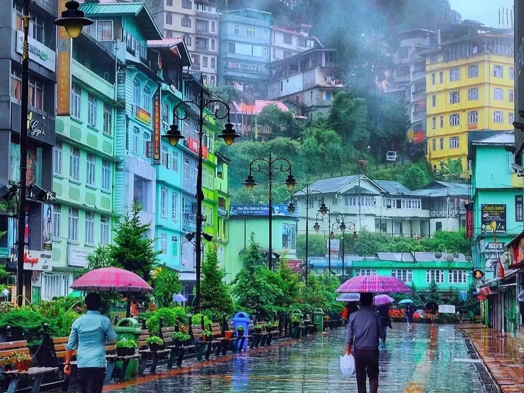 MG Marg Gangtok Sikkim vibrant pedestrian street with colorful buildings and scenic hillside city views
