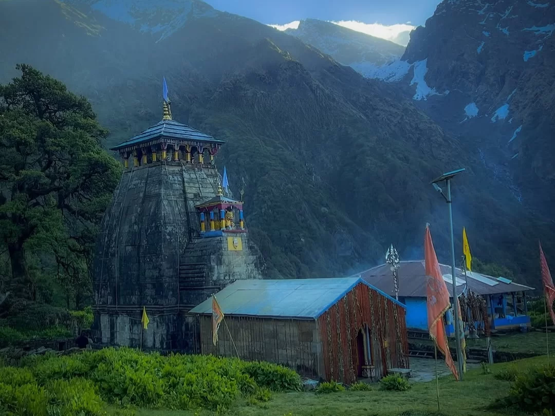 Madhyamaheshwar Temple scenic Himalayan pilgrimage shrine with mountain valley views and Kedarnath trek travel route information in Uttarakhand tour packages