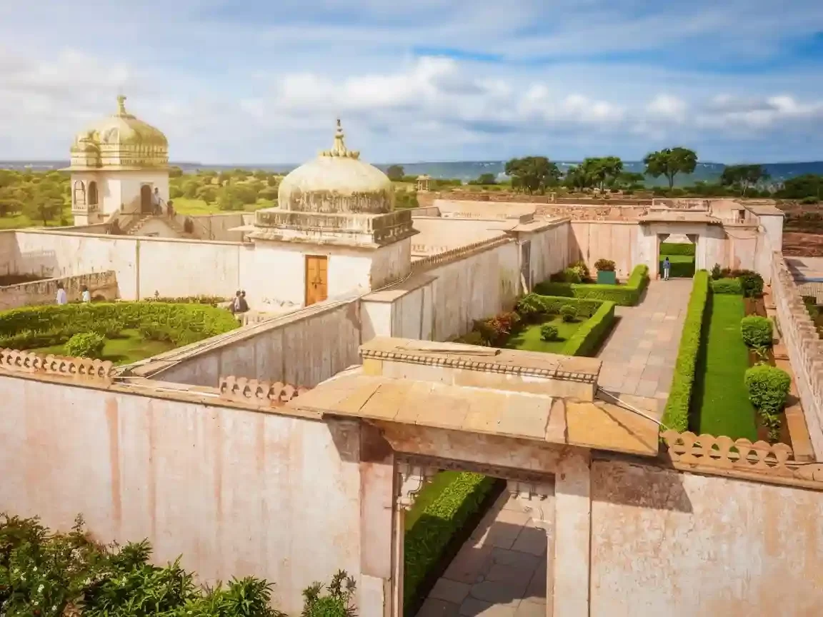 Maharani Padmini Palace Chittorgarh Historic white palace floating in a lotus pool inside Chittorgarh Fort Rajasthan.