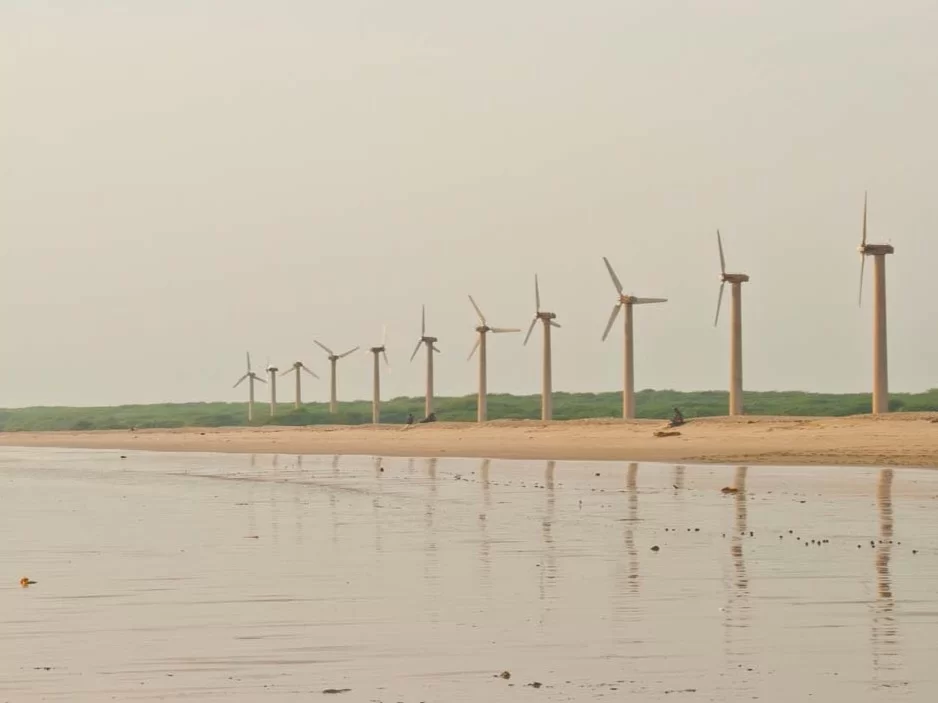 Mandvi Beach and Windfarm Gujarat, scenic coastal shoreline with wind turbines, popular tourist attraction in Kutch for sunset and nature views.