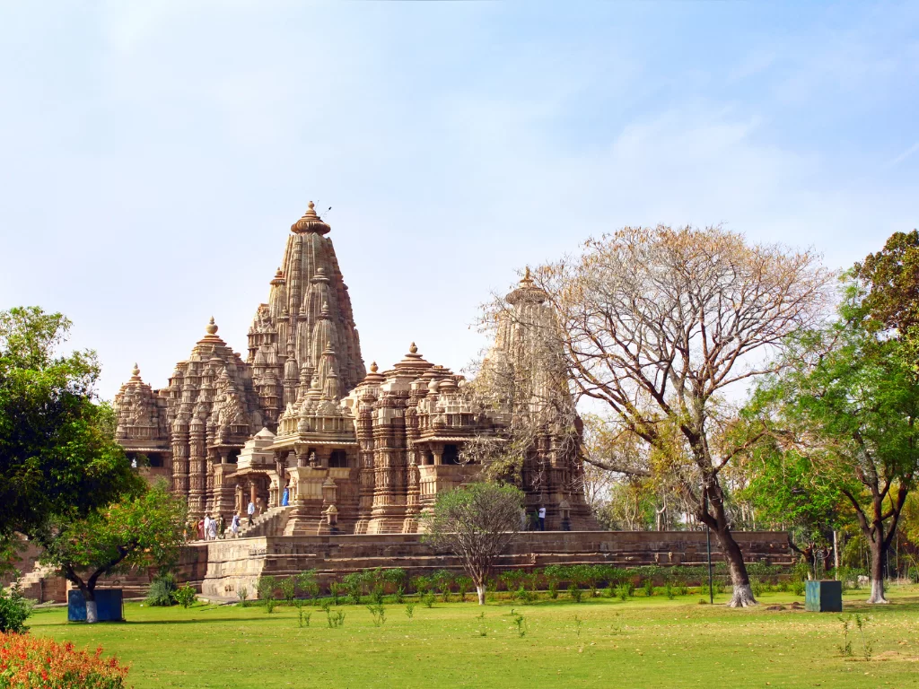 Vamana Temple Khajuraho Eastern Group UNESCO site, Nagara-style Vishnu dwarf avatar shrine intricate apsaras carvings Chandela dynasty 1050-1075 AD, ideal Madhya Pradesh heritage temple tour package.