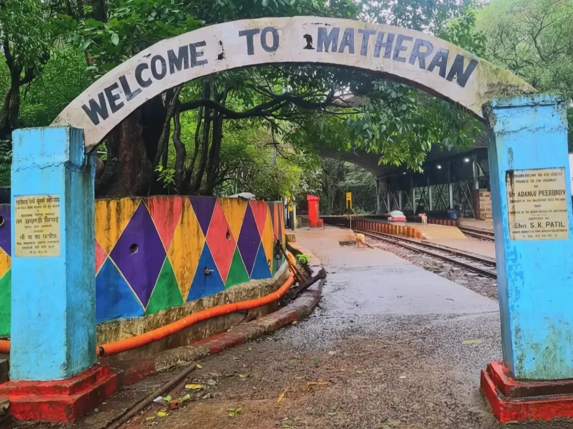 Matheran hill station welcome arch and toy train track in Maharashtra tour packages