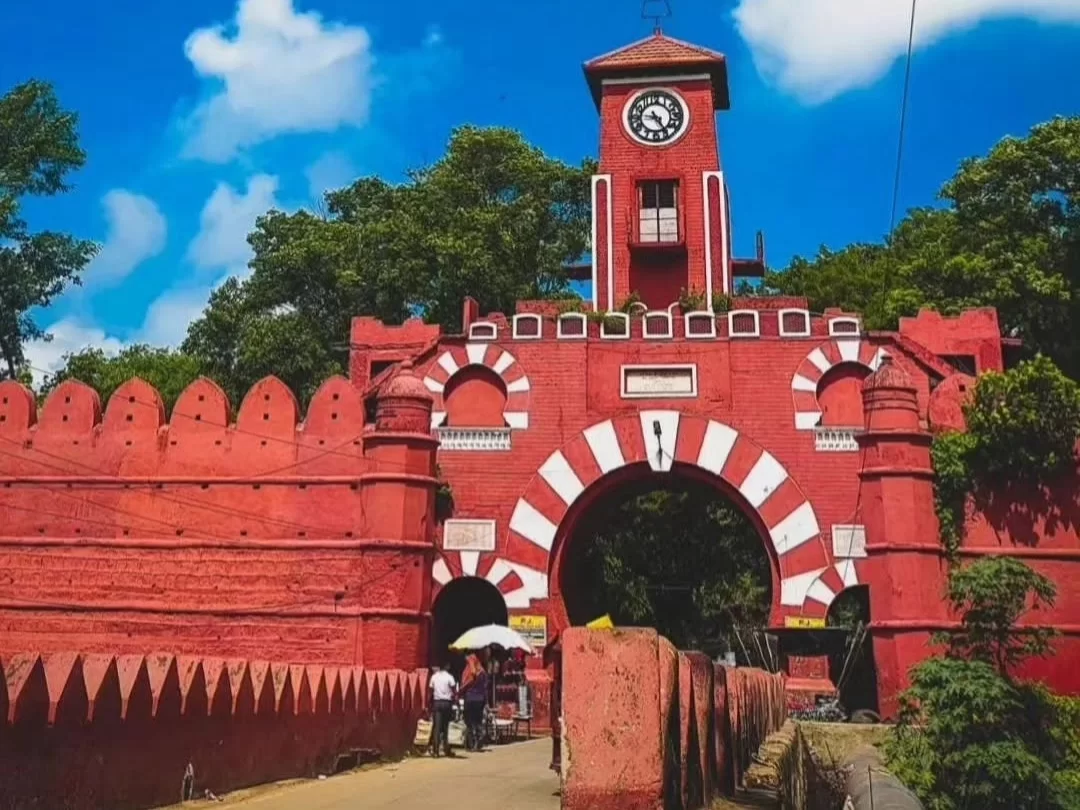 Munger Fort Bihar historic red sandstone gateway with clock tower ancient Mughal era architecture
