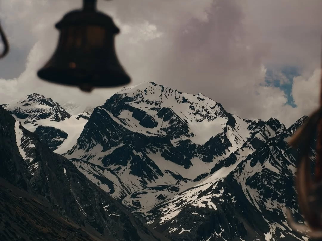 Om Parvat sacred Himalayan peak with natural Om symbol and snow covered mountain landscape in Uttarakhand tour packages.