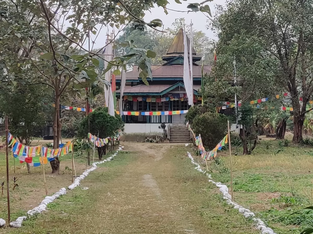 Pasighat Buddhist Temple in Arunachal Pradesh with prayer flags and serene monastery setting