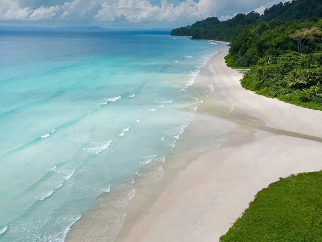 Radhanagar Beach, pristine white sand beach on Havelock Island (Swaraj Dweep) known for turquoise waters and breathtaking sunsets.