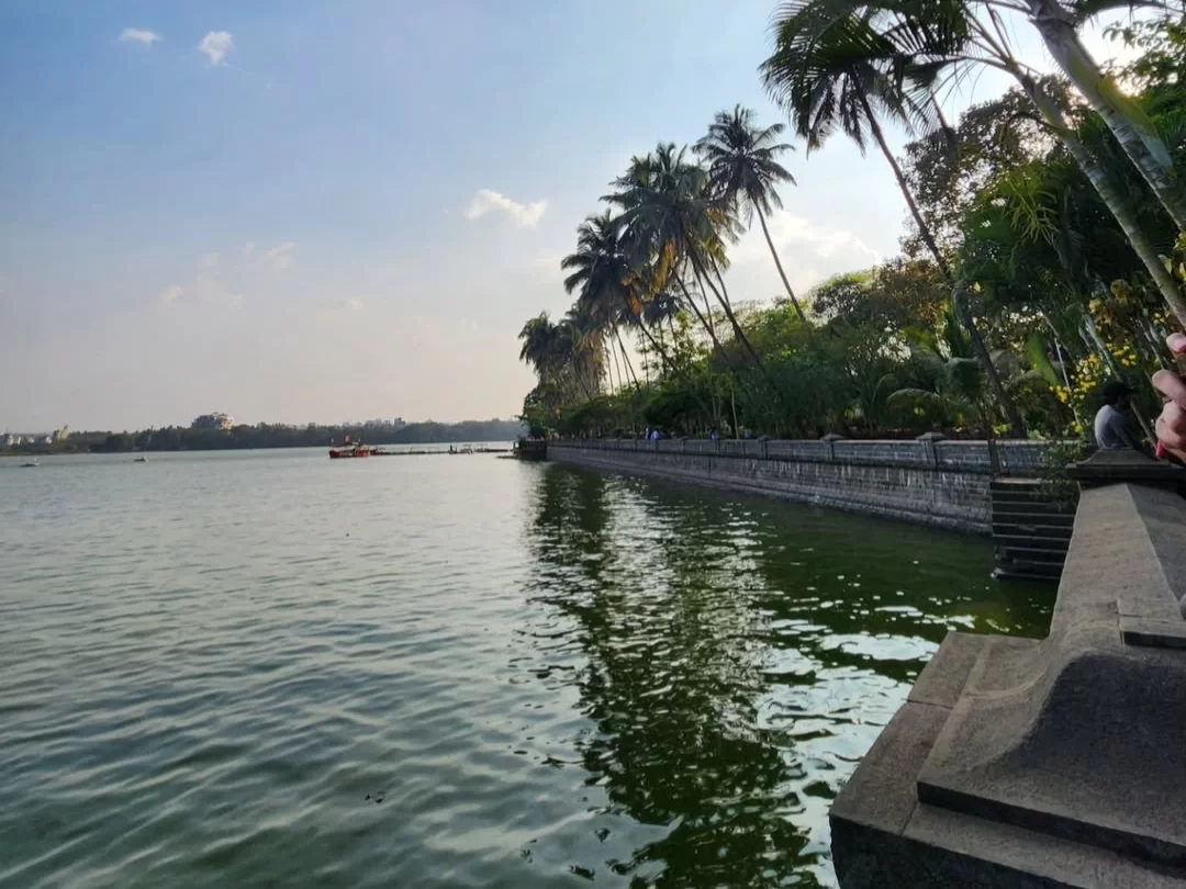 Rankala Lake in Maharashtra featuring calm waters, palm-lined promenade and scenic sunset views, a popular leisure spot included in Maharashtra tour packages