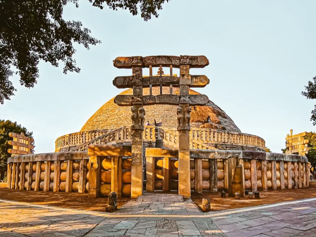 Sanchi Stupa in Sanchi, Madhya Pradesh with carved stone torana gateway and ancient Buddhist dome, featured in Madhya Pradesh tour packages