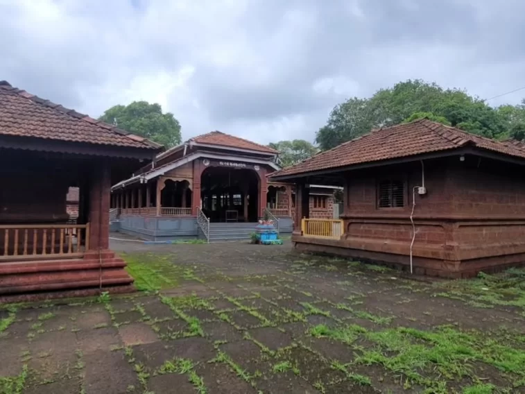 Shri Kanakaditya Mandir in Maharashtra featuring traditional Konkan-style wooden temple architecture with tiled roofs and open courtyard, a historic spiritual site included in Maharashtra tour packages