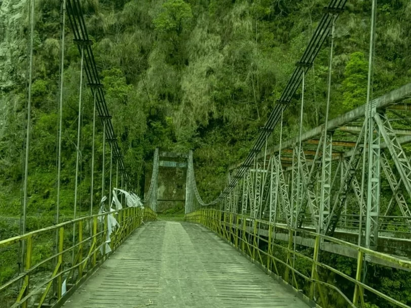 Singhshore Bridge West Sikkim scenic suspension bridge over lush Himalayan valley and river gorge