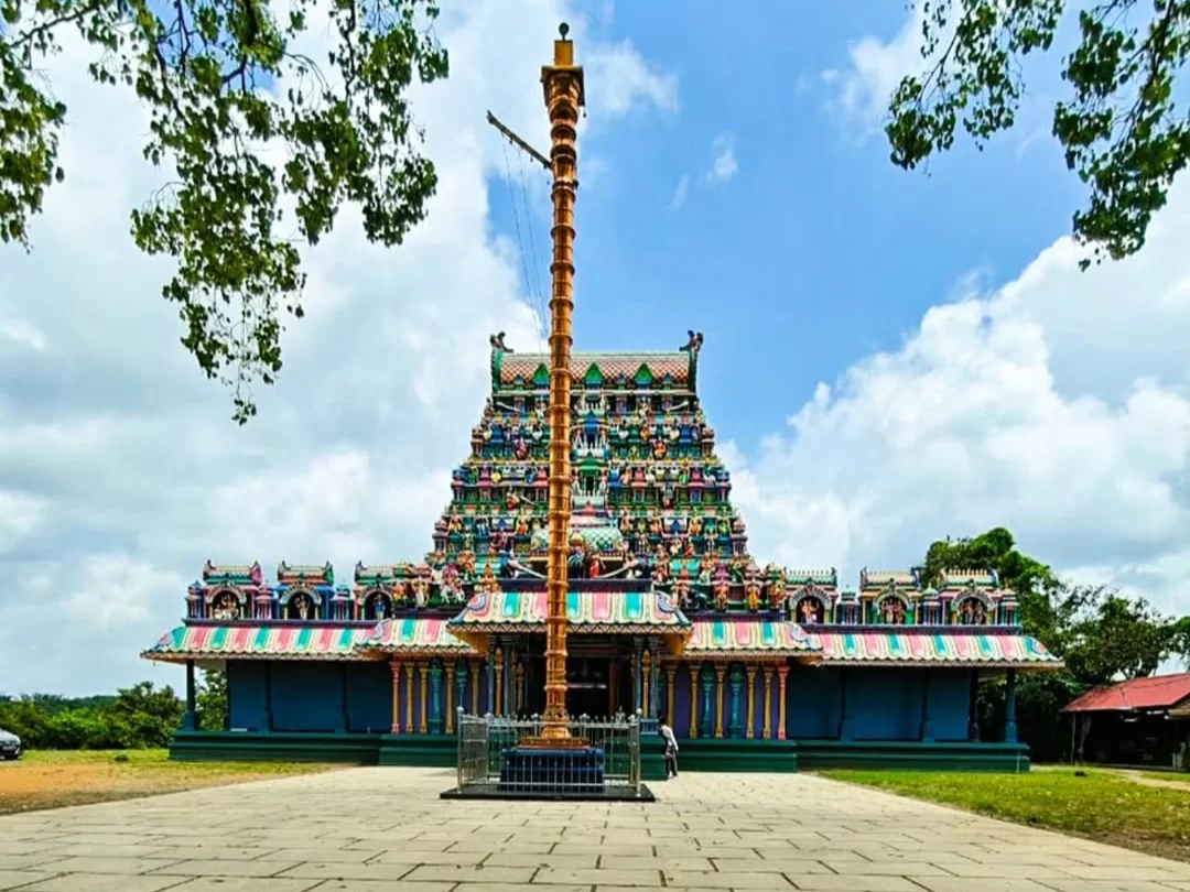 Sri Subramanya Swamy Temple, colorful gopuram with golden flagpole and traditional South Indian temple architecture