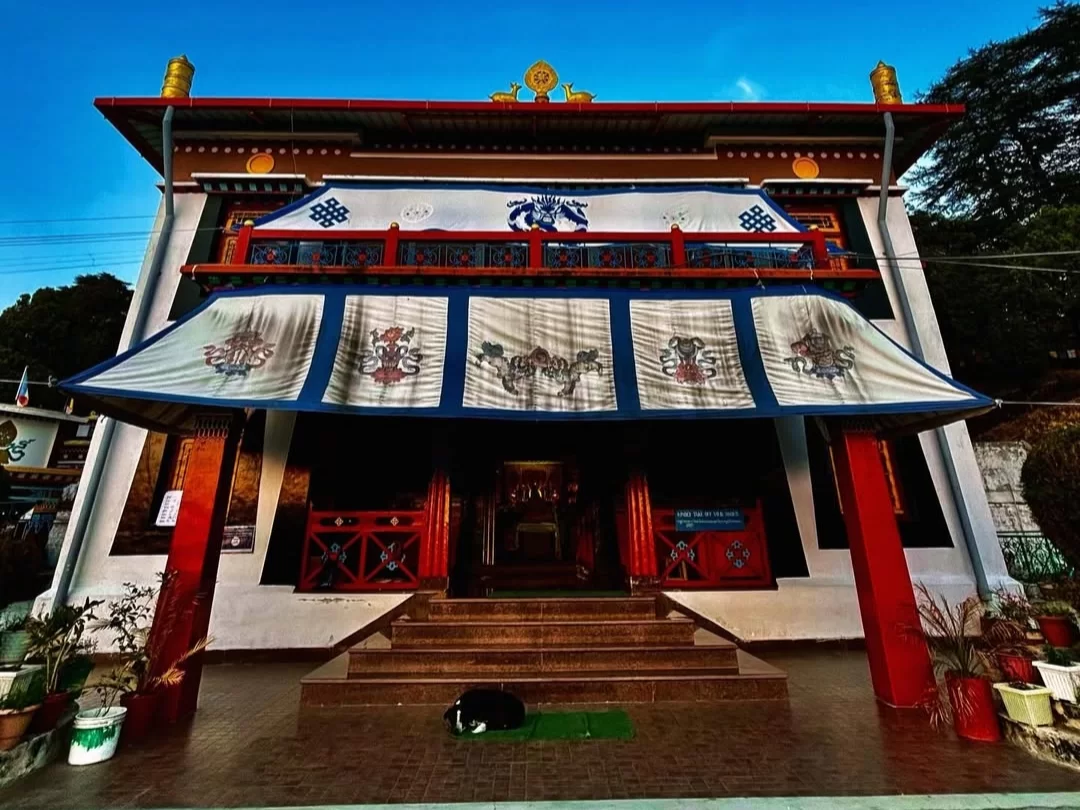 Tibetan Buddhist Temple in Mussoorie, Uttarakhand featuring colorful traditional architecture and prayer motifs, a peaceful spiritual attraction included in Uttarakhand tour packages