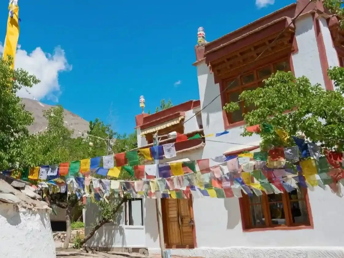 Turtuk Monastery, peaceful Buddhist monastery in Turtuk village, Ladakh adorned with colorful prayer flags and stunning mountain views.
